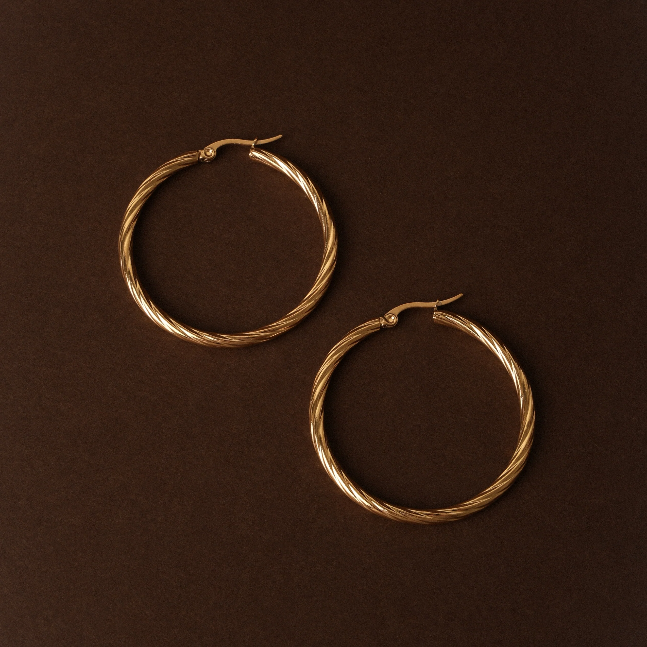 Bold Twisted Hoops - Image 3